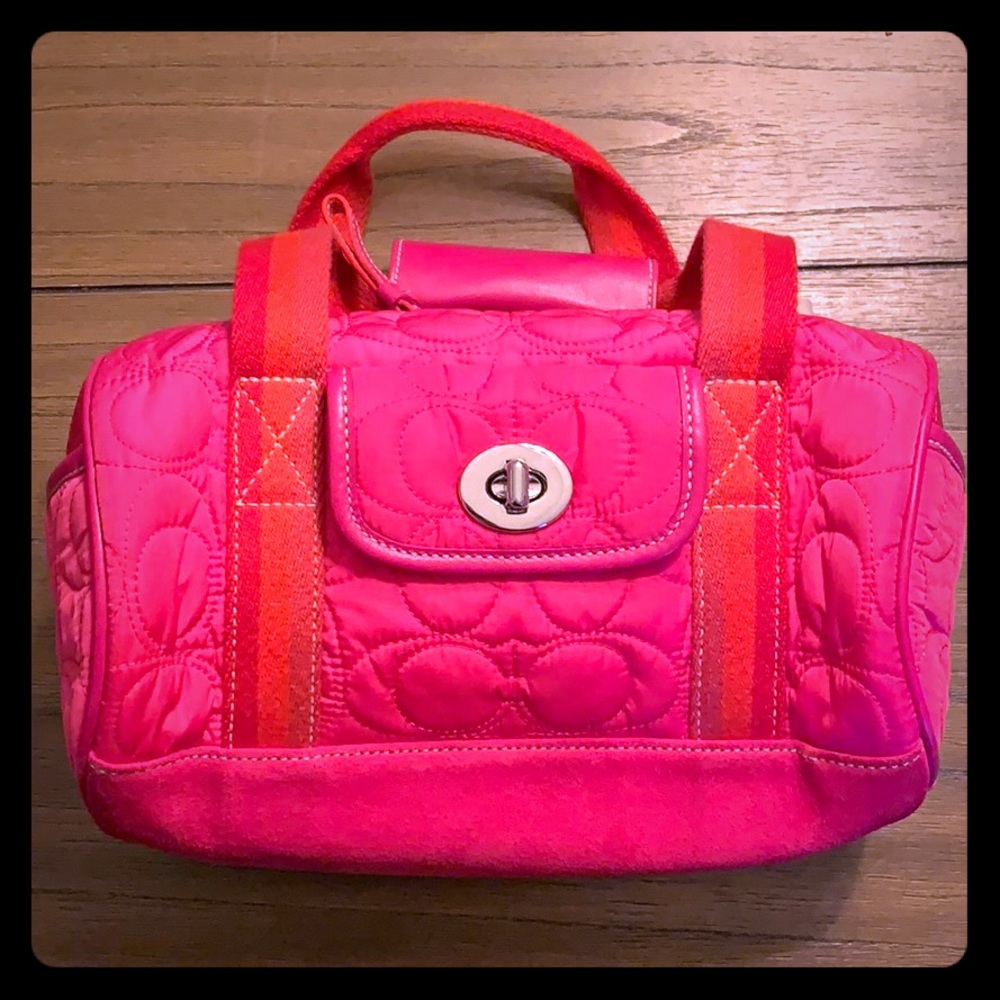 Coach bright pink and orange mini barrel bag